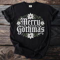 Black t-shirt with "Merry Gothmas" text, skulls, poinsettias, and leaves.
