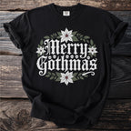 Black t-shirt with "Merry Gothmas" text, skulls, poinsettias, and leaves.