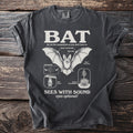 Dark gray t-shirt with white text and illustrations about bats.