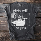 T-shirt with text "girls will be girls" and vintage dinner party image.