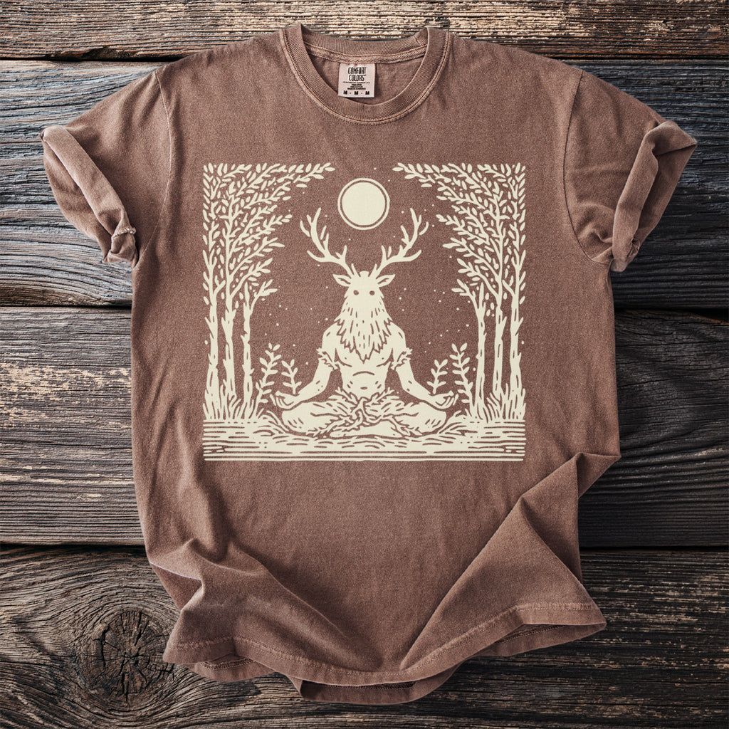 Brown t-shirt with a white line art graphic of a deer-headed figure meditating.