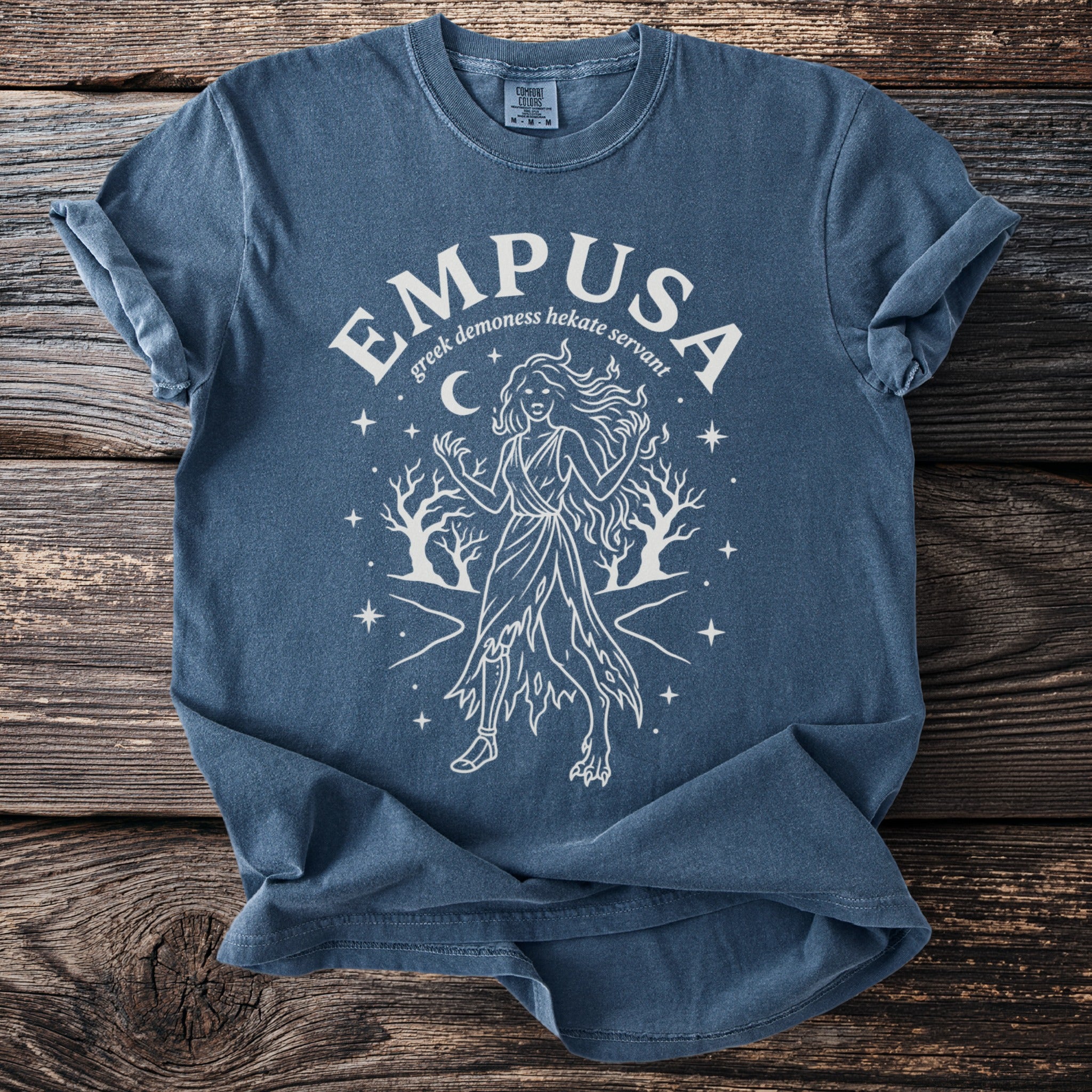 Blue t-shirt with white "Empusa Greek demoness Hekate servant" text and illustration.