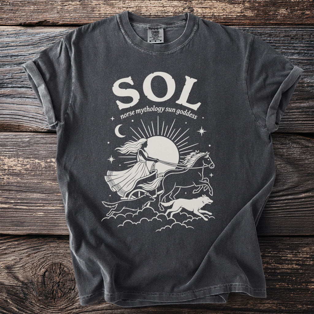 Dark gray t-shirt with white graphic of Sol, Norse sun goddess, in a chariot pulled by horses and wolves.