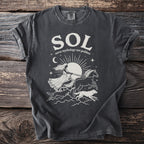 Dark gray t-shirt with white graphic of Sol, Norse sun goddess, in a chariot pulled by horses and wolves.