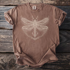 Brown t-shirt with a white, ornate dragonfly graphic design.