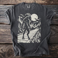 Graphic tee with goatman holding axe on bridge with car and moon.