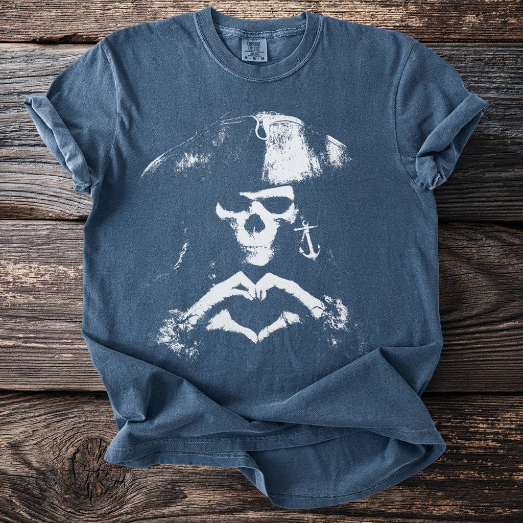 Blue t-shirt with a white pirate skull graphic making a heart shape.