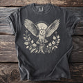 Dark grey t-shirt featuring a cream-colored linocut style print of a barn owl.