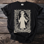 Black t-shirt with a beige graphic of a robed figure with a staff, two ravens, and moon.