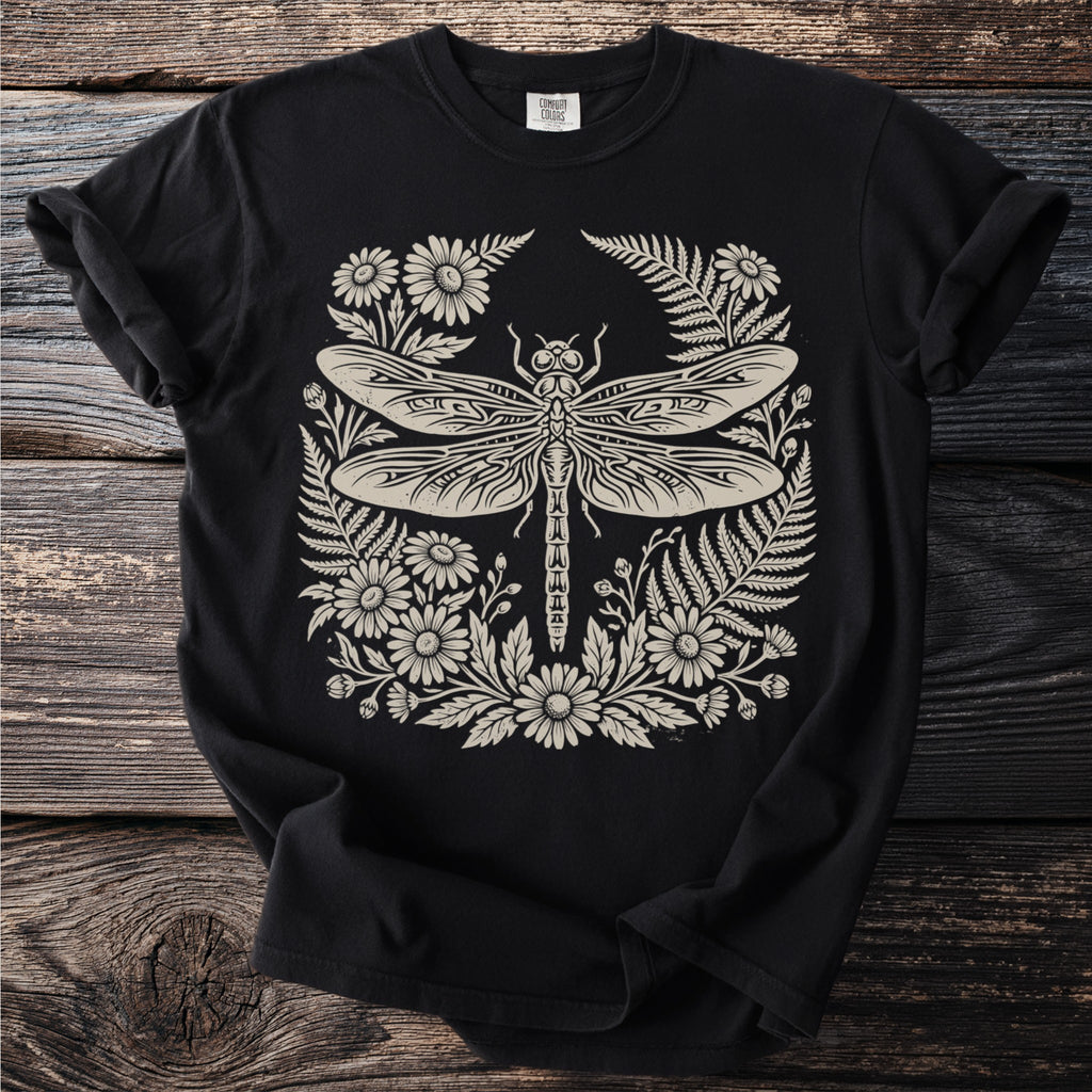 Black t-shirt with cream dragonfly and floral design.