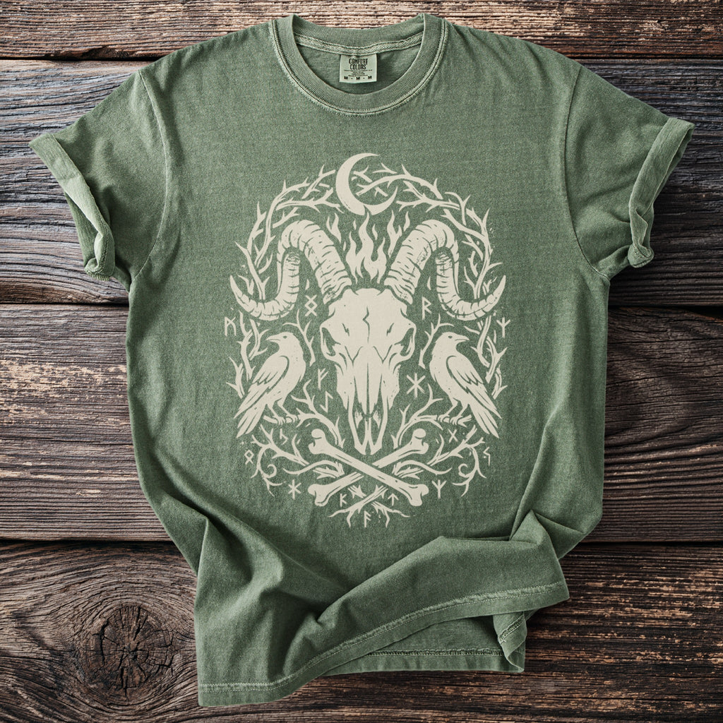 Green t-shirt with ram skull, ravens, bones, runes, and crescent moon graphic.