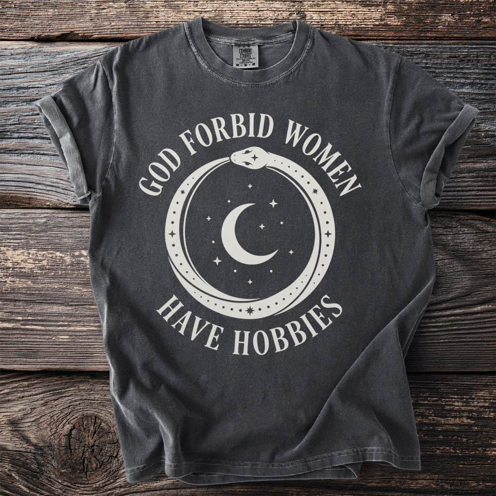 Dark grey t-shirt with white text and celestial snake graphic.