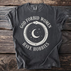Dark grey t-shirt with white text and celestial snake graphic.