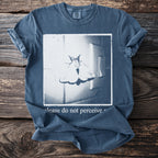 Blue t-shirt with a moth graphic and text "please do not perceive".