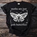 Black t-shirt with white text "moths are just goth butterflies" and moth graphic.