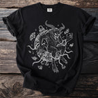 Black t-shirt with a white illustration of a horned creature, chains, and bells.