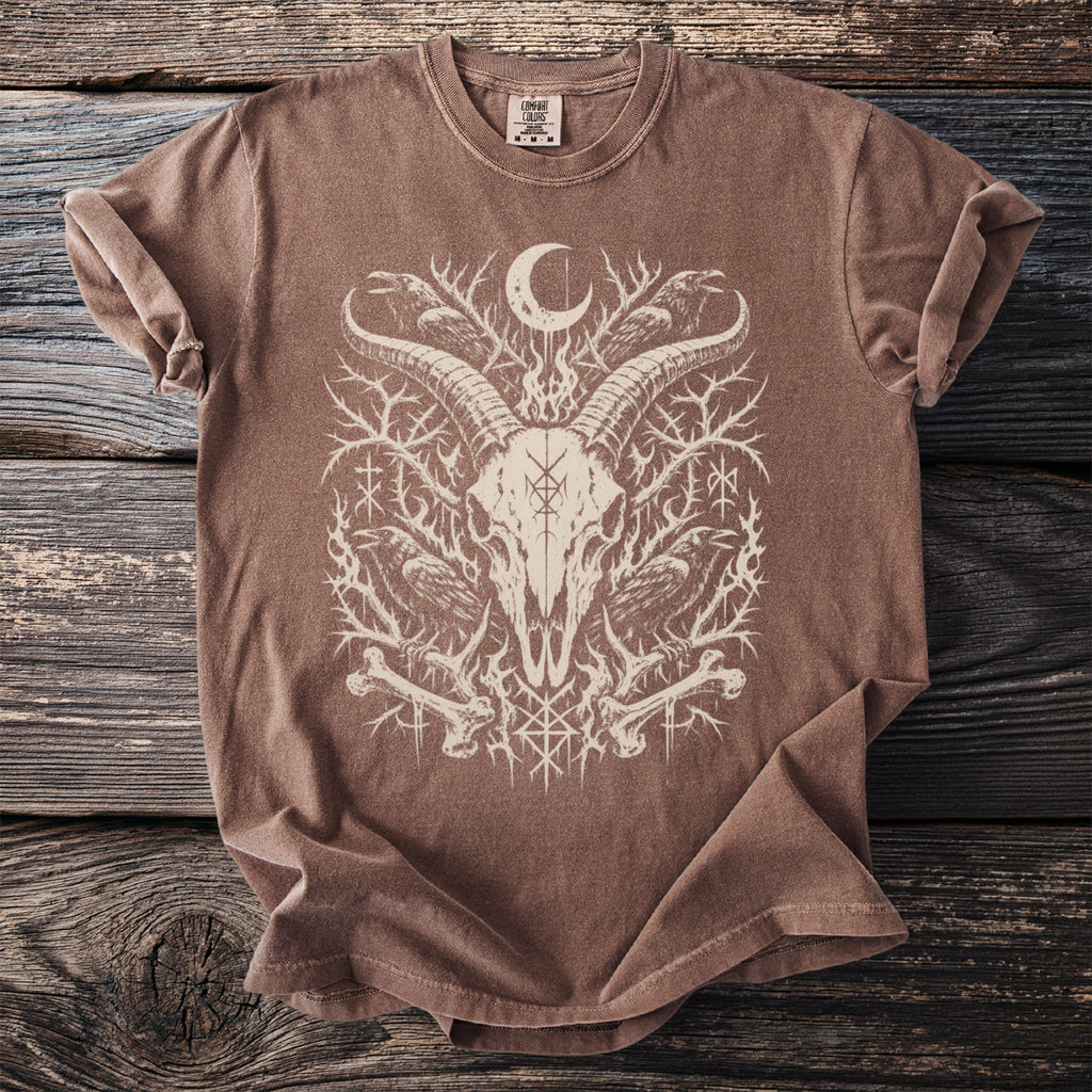 Brown t-shirt with occult graphic of goat skull, ravens, moon, and runes.