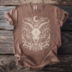 Brown t-shirt with occult graphic of goat skull, ravens, moon, and runes.