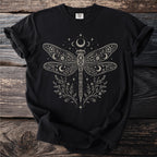 Black t-shirt with a detailed white dragonfly and floral celestial design.