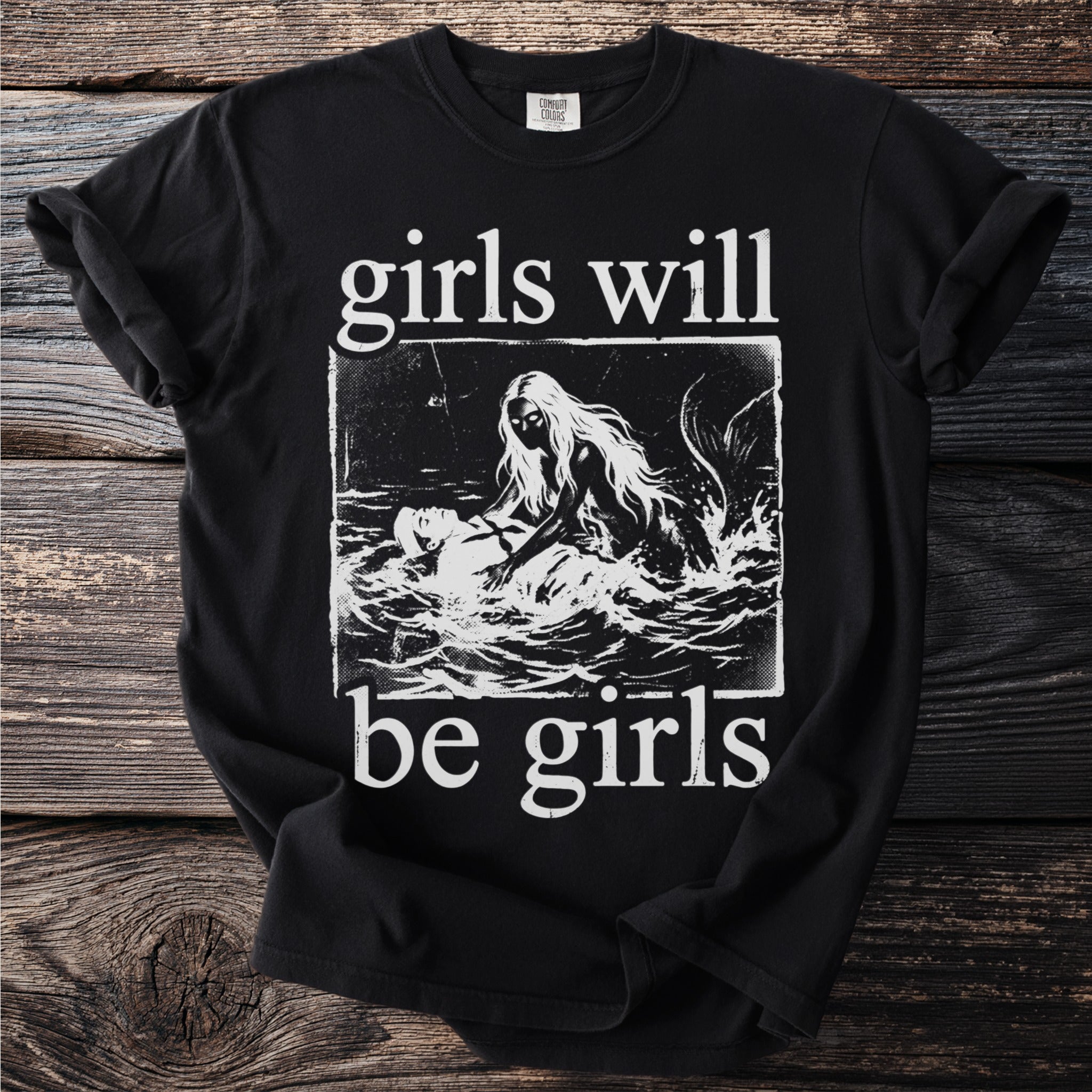 Black t-shirt with white text and illustration of a mermaid pulling a man from water.