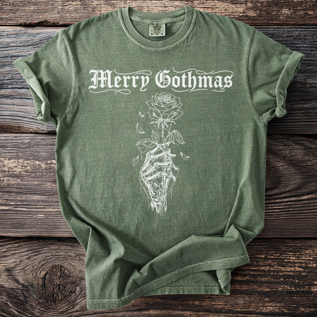 Green t-shirt with "Merry Gothmas" text and a skeleton hand holding a rose.