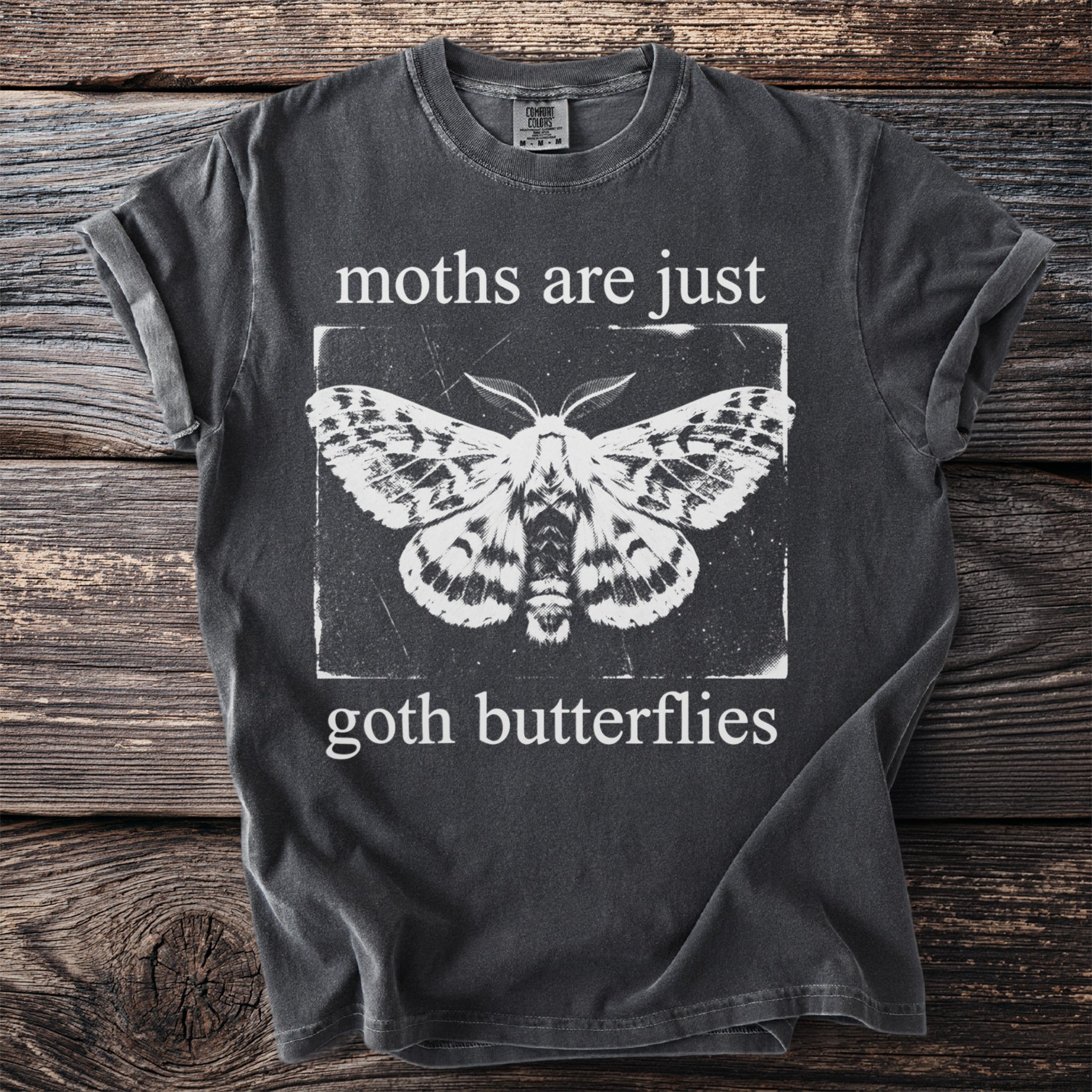 Dark gray t-shirt with "moths are just goth butterflies" and moth graphic.