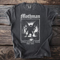 Mothman Appalachian Tour 1966-1967 graphic on a charcoal t-shirt.