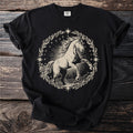Black t-shirt with a beige drawing of a horse within a circular thorny wreath.