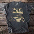 Dark gray t-shirt with a beige graphic of a frog holding a mug.