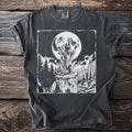 Black t-shirt with graphic of a raccoon howling at the full moon.
