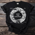 Black t-shirt with white graphic of cave creatures: salamander, fish, crawfish, beetle, glow worm, and mushrooms.