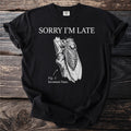 Black t-shirt with "SORRY I'M LATE" and cicada illustration.