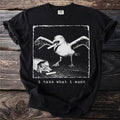 Black t-shirt with a graphic of a seagull eating fries and text "i take what i want".