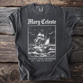 Dark t-shirt with a vintage illustration of the Mary Celeste ship and text.