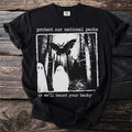 Black t-shirt with "protect our national parks" and a spooky forest scene.