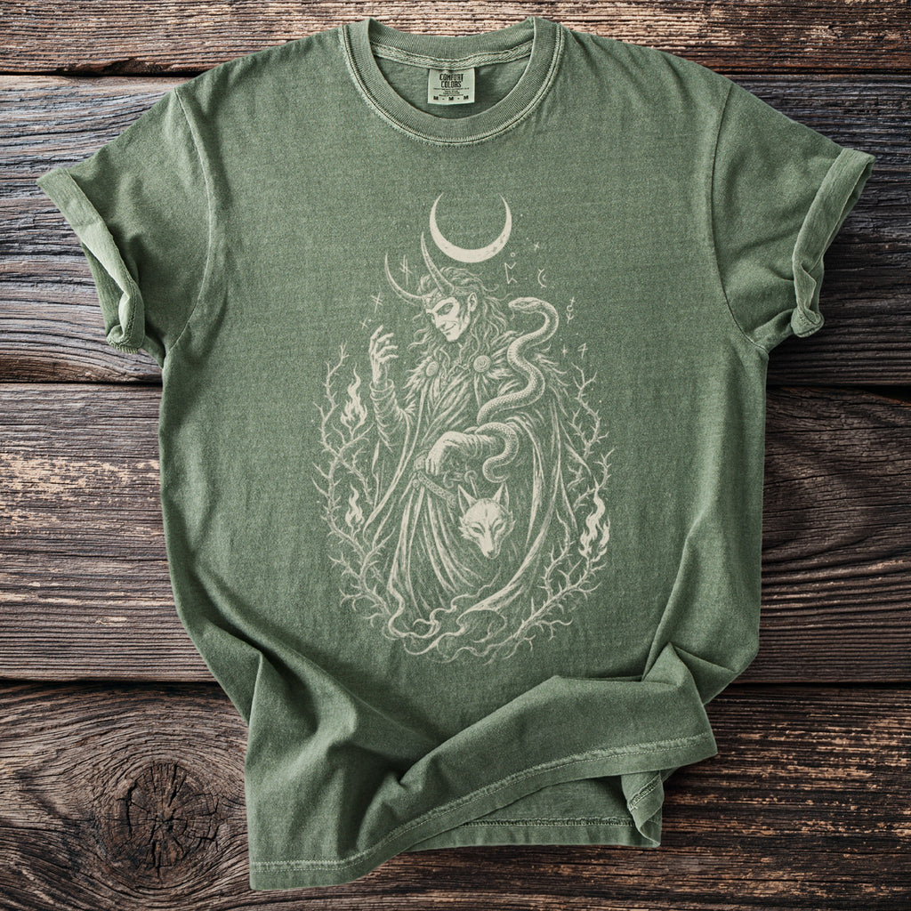 Green t-shirt with a white print of a horned figure, snake, wolf head, and moon.