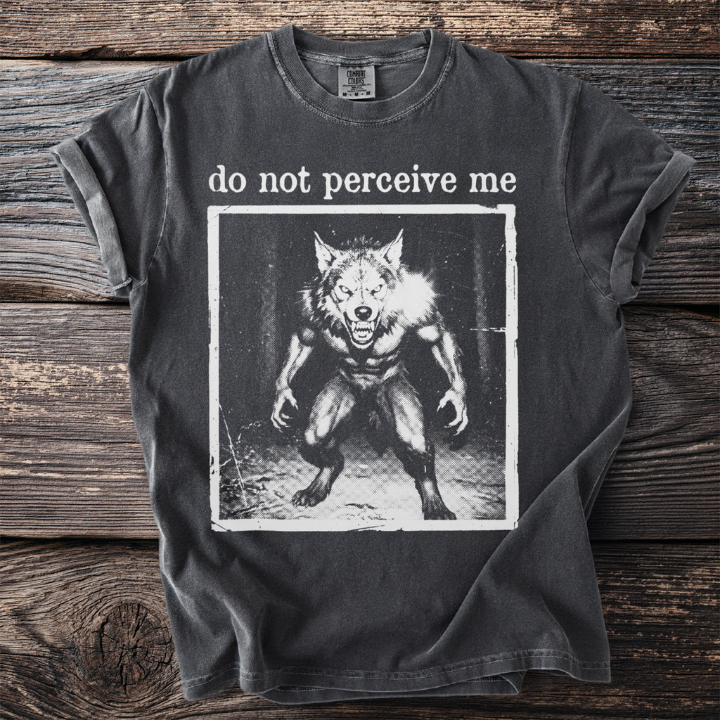 Dark t-shirt with "do not perceive me" text and a werewolf graphic.
