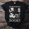 Black t-shirt with "INTROVERTED BUT WILLING TO DISCUSS BOOKS" text and black cat illustration.