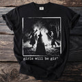Black t-shirt with a graphic of three witches around a bonfire and text "girls will be girl".