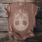 Brown t-shirt with a cream-colored graphic of Yggdrasil, ravens, moon, and runes.