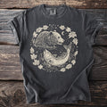 Dark gray t-shirt with circular graphic of a bear and fish with leaves and moon.