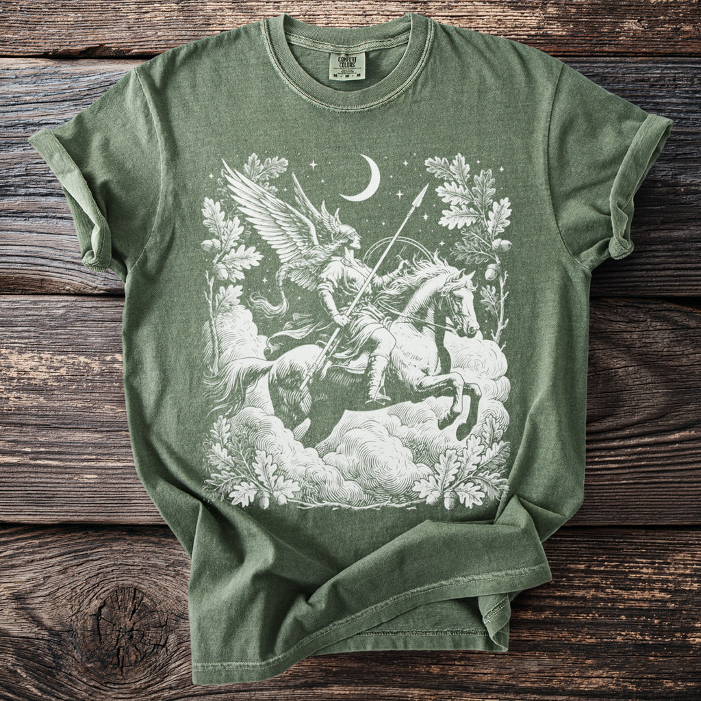 Green t-shirt with a white mythological winged figure on a horse against clouds and stars.