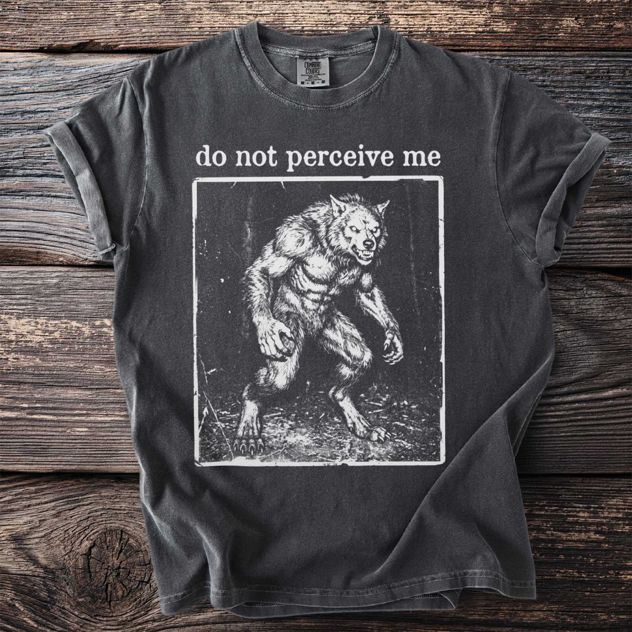 Charcoal t-shirt with a distressed werewolf illustration and text "do not perceive me."