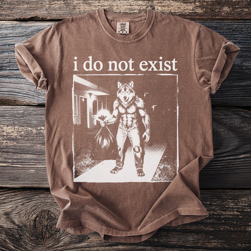 Brown t-shirt with "i do not exist" text and a wolf man graphic.