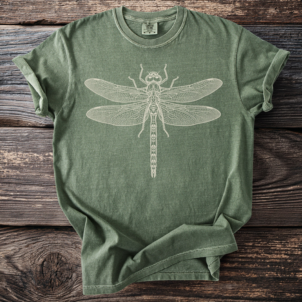 Green t-shirt with a white line drawing of a dragonfly on the front.