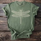 Green t-shirt with a white line drawing of a dragonfly on the front.