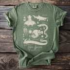 Green t-shirt with "The Abyss" and illustrations of deep-sea creatures.