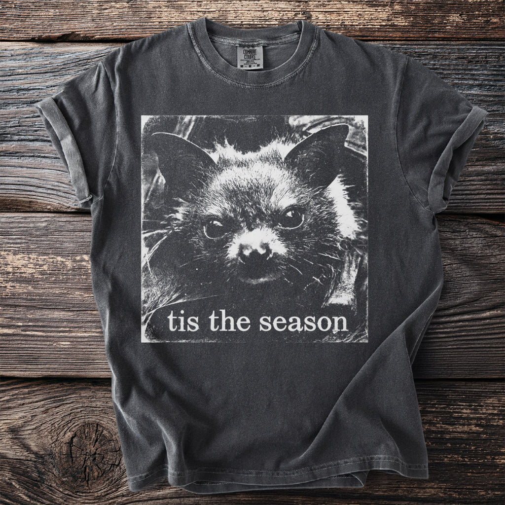 Dark charcoal t-shirt with a black and white bat face graphic and text "tis the season".