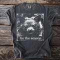 Dark charcoal t-shirt with a black and white bat face graphic and text "tis the season".