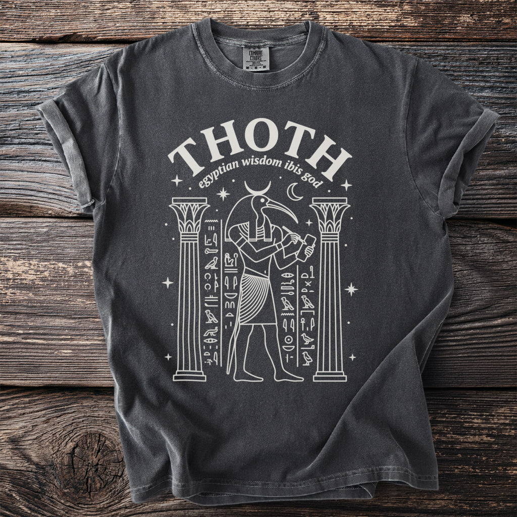 T-shirt with white graphic of Thoth, Egyptian wisdom ibis god, between columns.